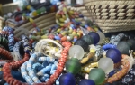 Recycled glass beads made into bracelets and necklaces