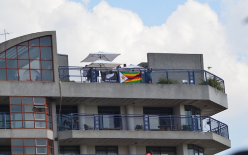 NZ and Zim Supporters on top of the Northcliffe Heights condos. Prime residential flats on the outskirts of the Avenues, Harare's red light district.