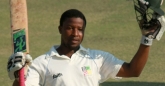 Tinotenda Mawoyo salutes after reaching his Maiden Test hundred