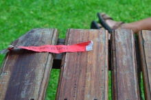 The red ribbon that determinse where you will sit