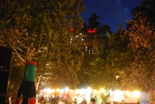 Food stalls in the Coca Cola Green at night