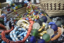 Recycled glass beads made into bracelets and necklaces