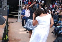 Rina Mushonga (in white) gets down at Hope Masikes show